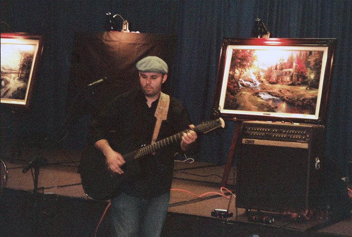 Luke Austin Daugherty performing at Thomas Kinkade event